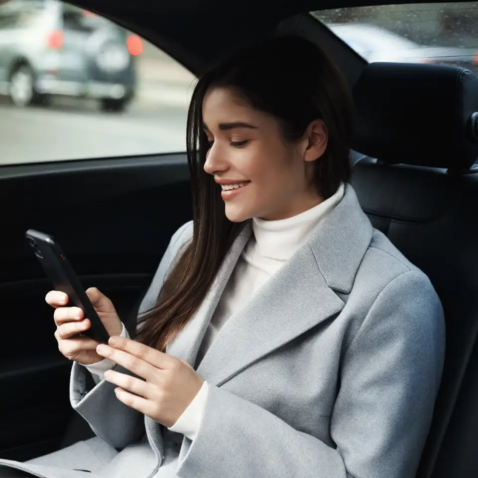 chauffeur service Tampa passenger booking ride inside luxury car